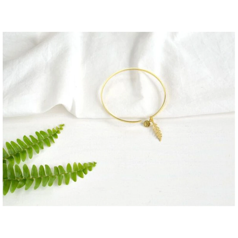 renna deluxe Armreif in Gold mit Farn Blatt