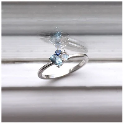 Eppi Cluster-Ring mit Aquamarin, Labradorit, Saphir und Diamant Bluma